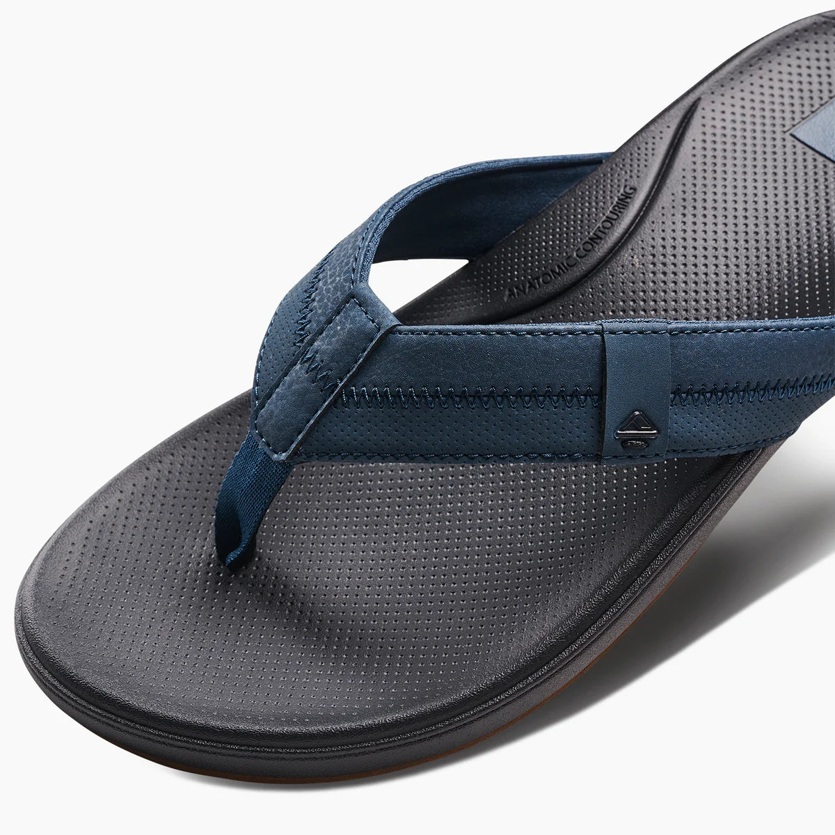 Reef Mens Cushion Phantom Flip Flops in navy blue with comfortable footbed design