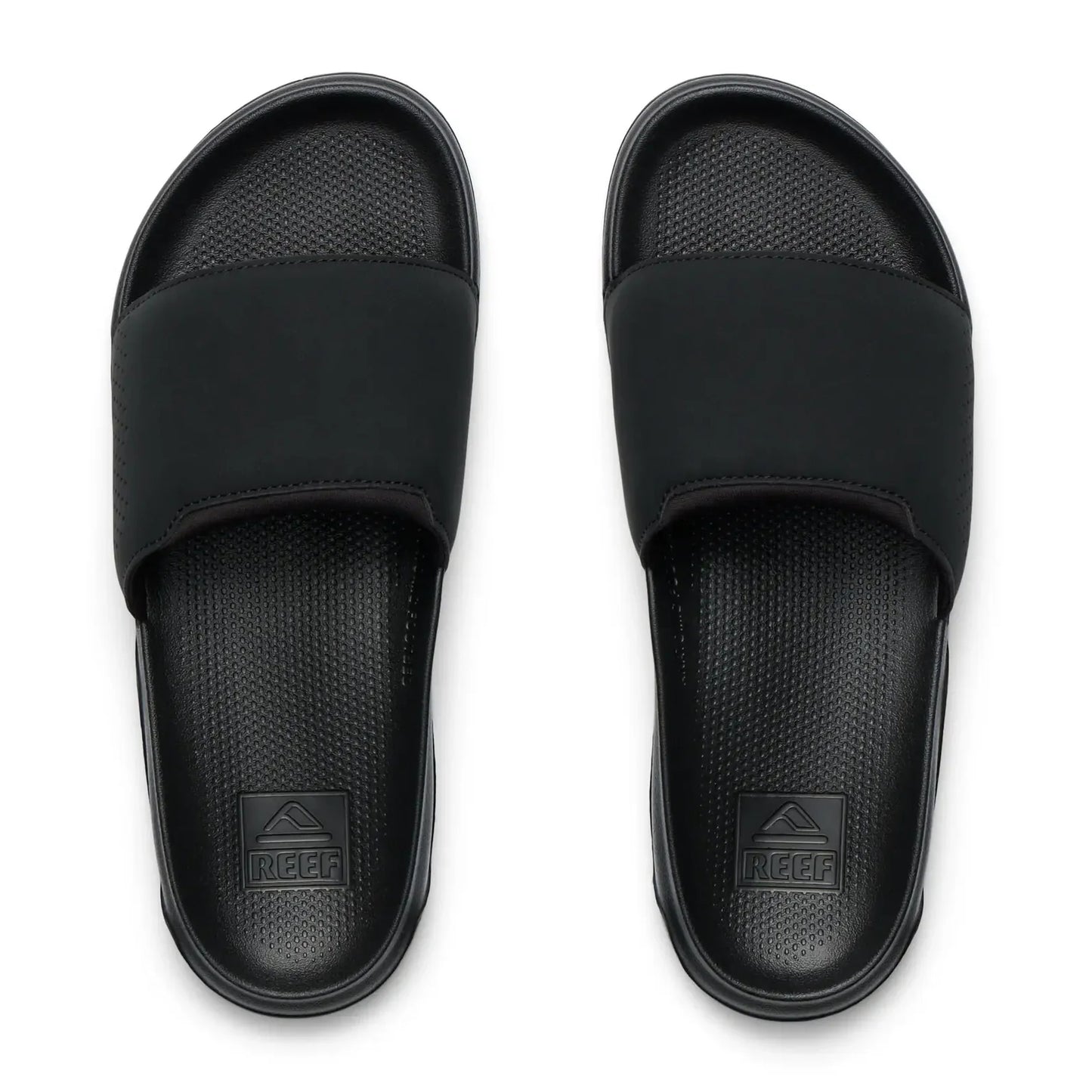 Top view of a pair of mens Reef Tailslide slider sandals in black with padded straps.