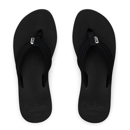 Top view of a pair of womens Reef Cushion Breeze flip flops in plain black