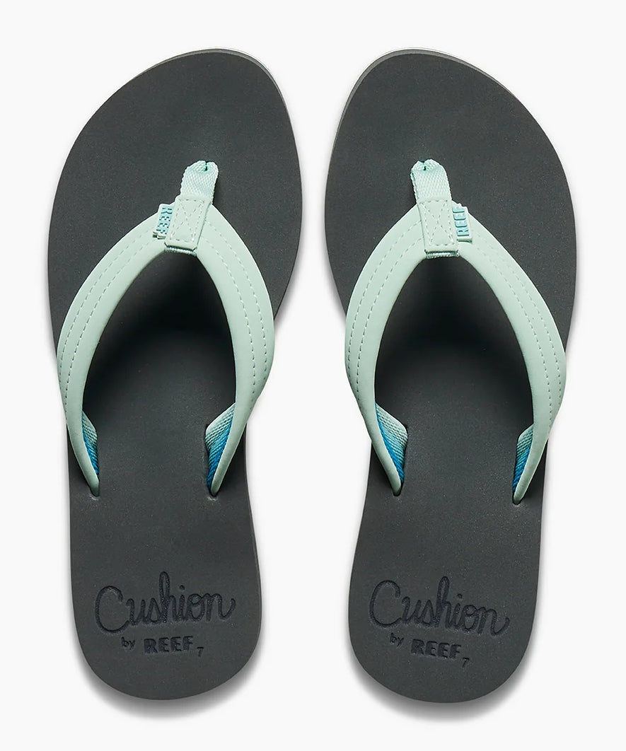 Reef womens Cushion Breeze flip flops in black with light blue straps and cushioned footbed for comfort