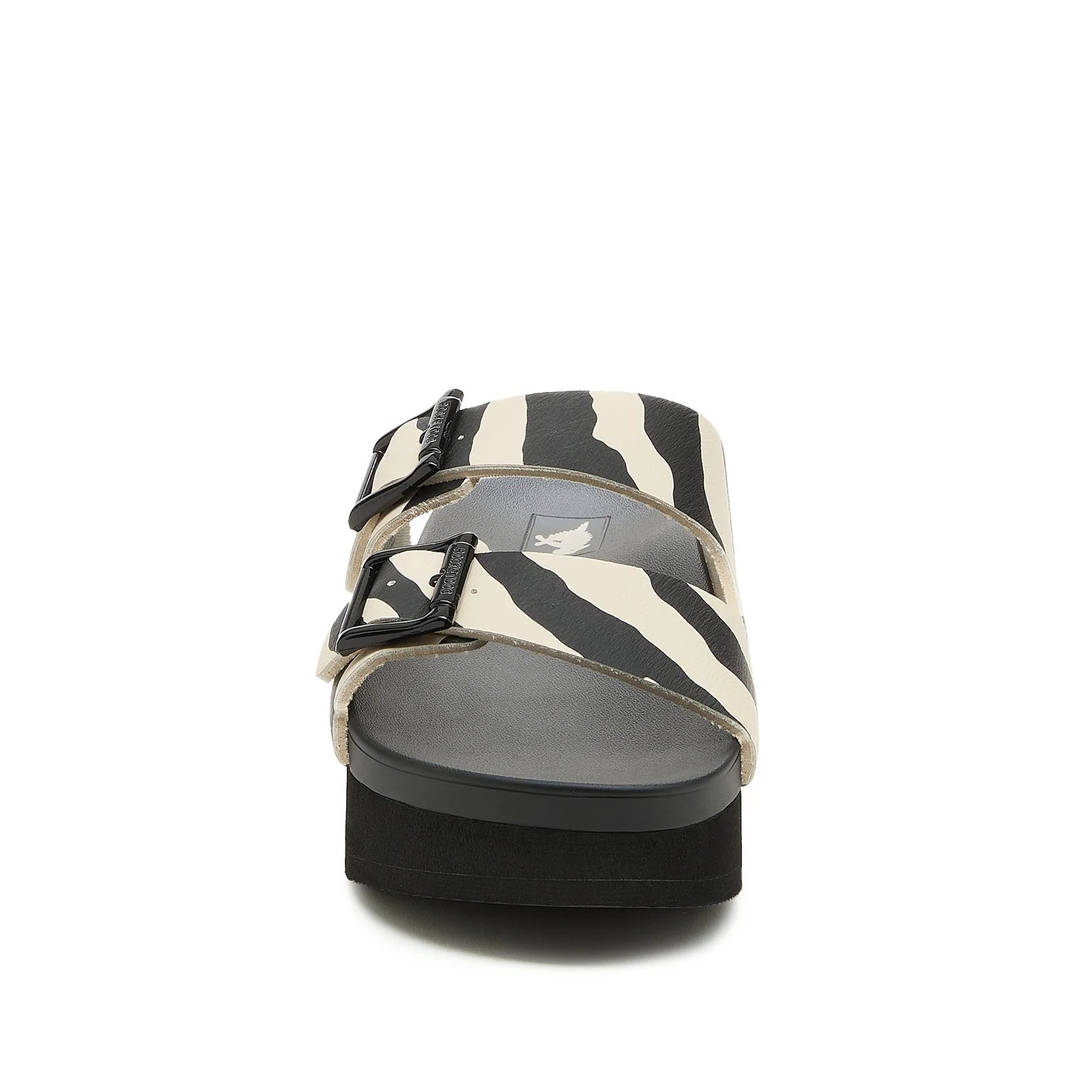 Front view of womens Rocket Dog Esti Plus platform slip on sandals, with two black and white zebra print straps with buckles.