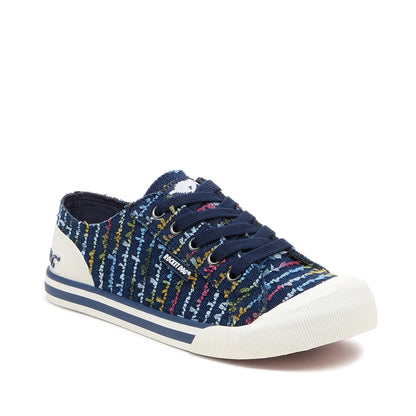 Main front view of Rocket Dog women's Jazzin Radio canvas lace up trainers in navy blue with a multicolour striped stitching pattern.
