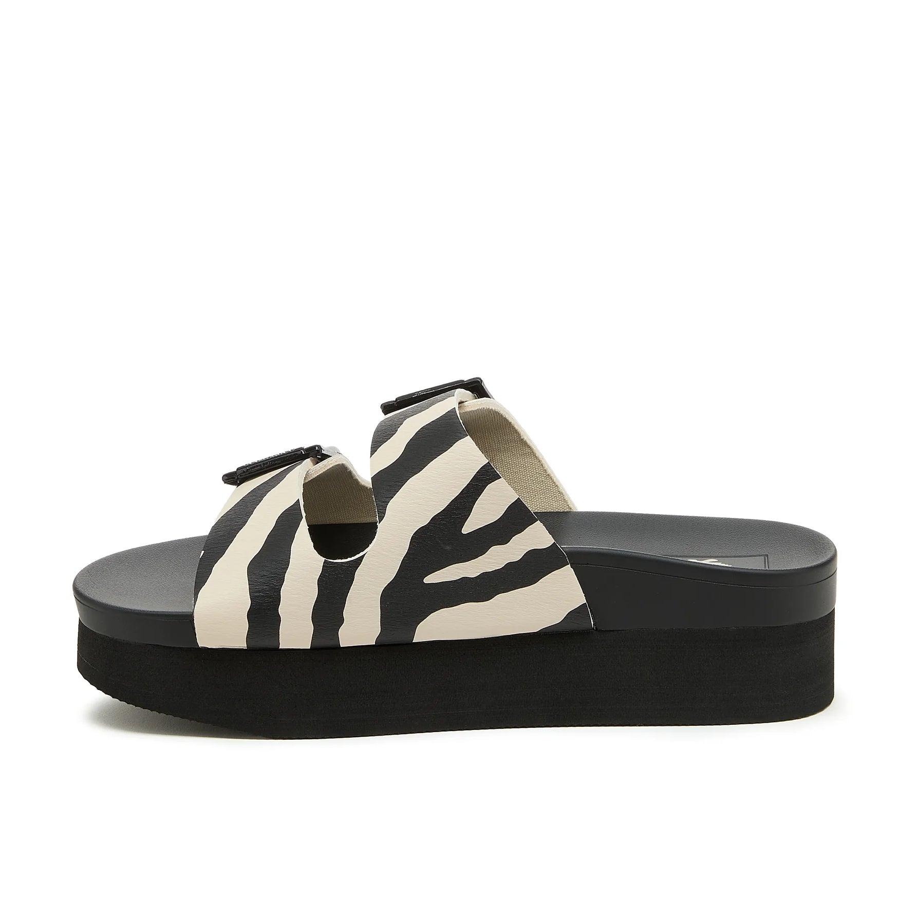 Side view of womens Rocket Dog Esti Plus slip on platform sandals, with two black and white zebra print straps