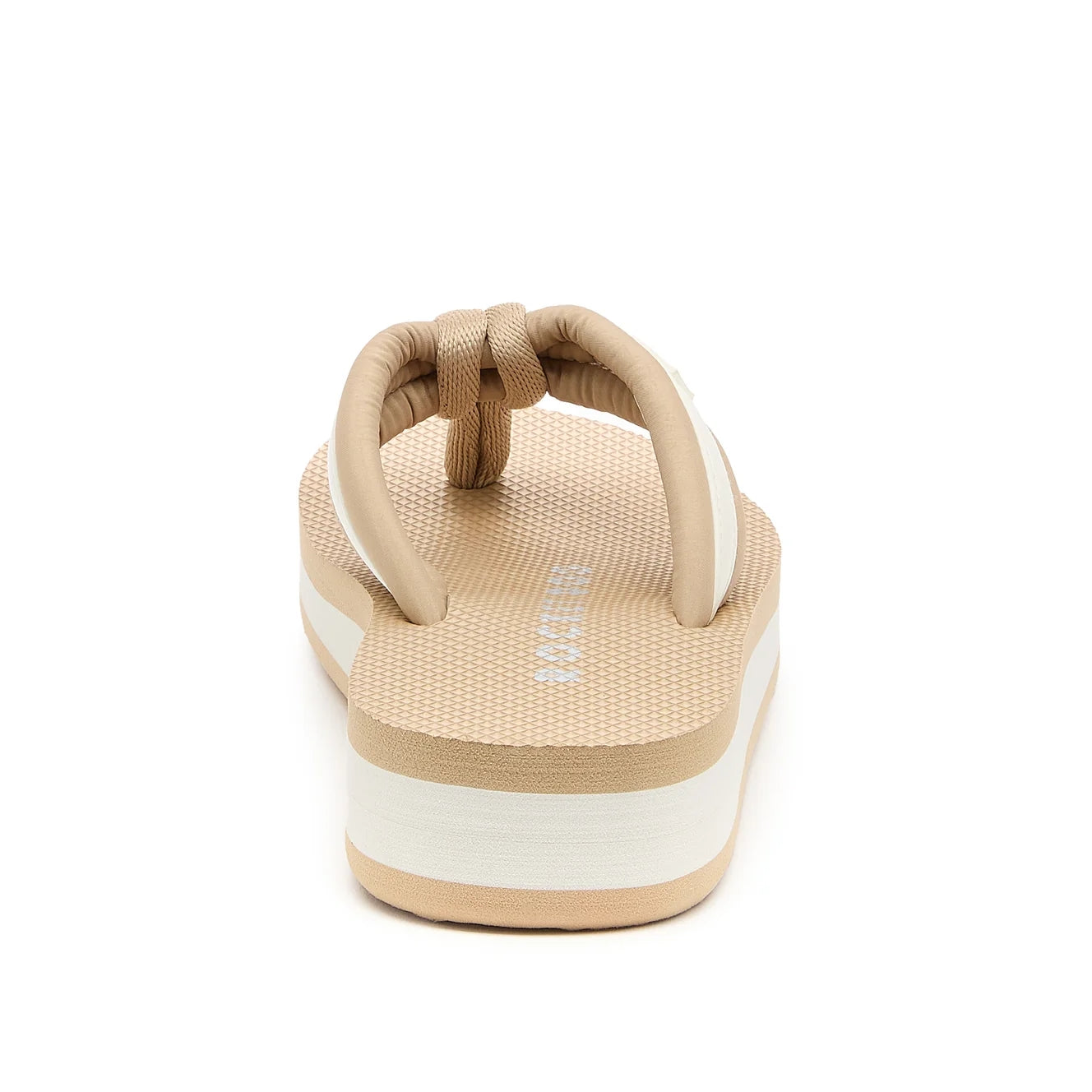 Back view of a women's Rocket Dog Monica Bristol flip flop in tan / off-white, with a platform sole.