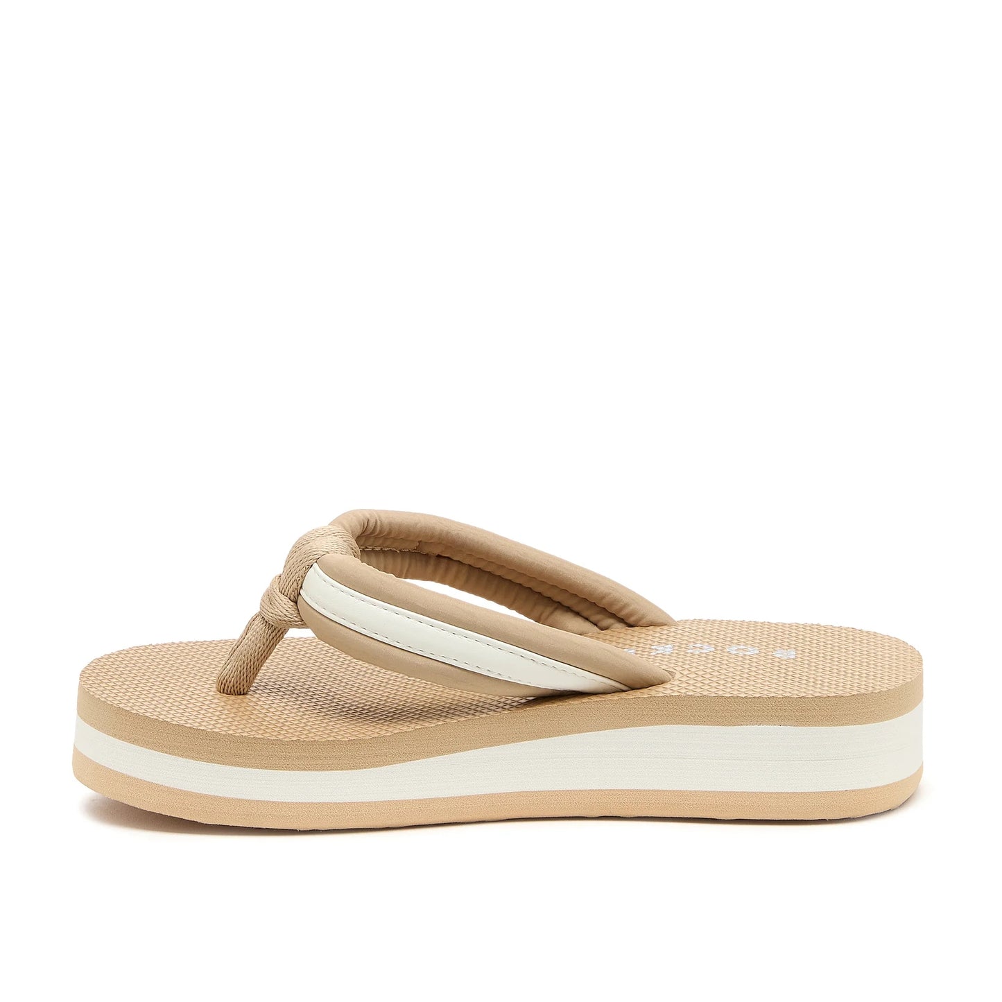 Sideview of a women's Rocket Dog Monica Bristol flip flop in tan / off-white, with a platform sole and padded strap.