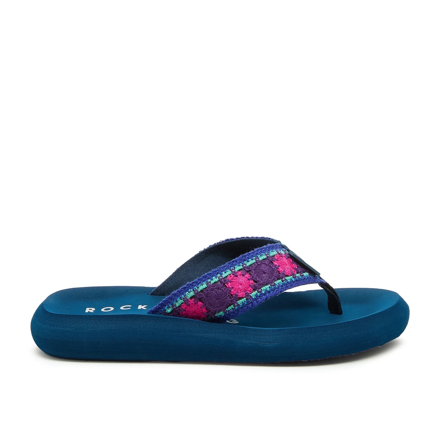 Side view of a womens Rocket Dog Spotlight Marlow flip flop with a navy sole and a purple, pink and turquoise embroidered strap.