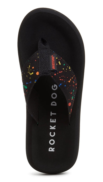 Women's Rocket Dog black Spotlight flip flops with multicoloured paint splash pattern.