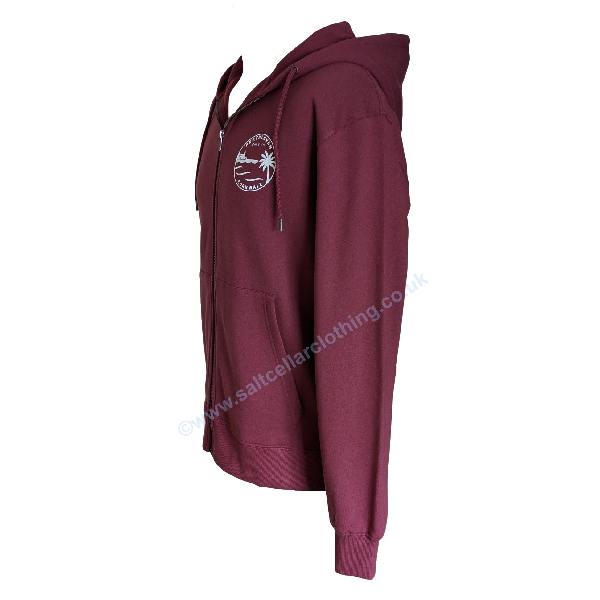 A Burgundy Red full zip hoodie shown from the side, featuring a small white circular graphic print featuring a clocktower and harbour, palm tree, waves, and the text 'PORTHLEVEN Salt Cellar' and 'CORNWALL'.