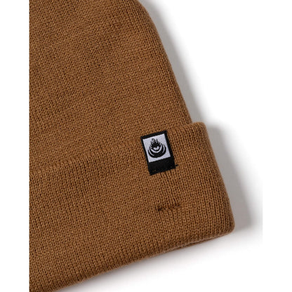 Brown knit Saltrock beanie with a logo tag on a white background