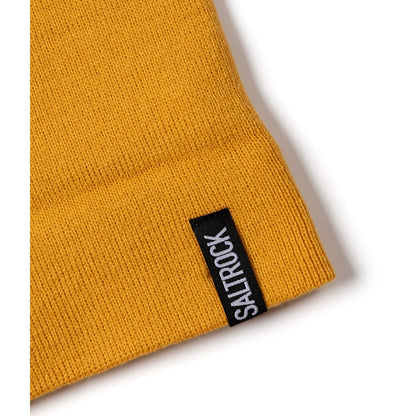 Yellow knit beanie with a black 'Saltrock' label on a white background