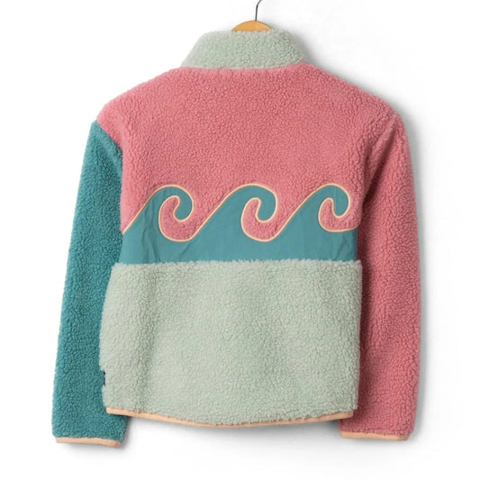 Back view of a kids Saltrock Emery Wave colour block fleece in bright pink, turquoise and teal with a wave pattern applique.