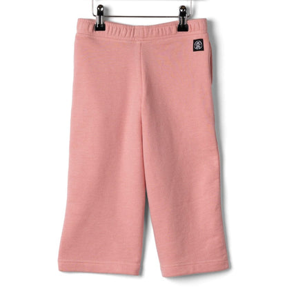 Back view of Saltrock kids Norie wide leg jogger trousers in pink with a small black logo label