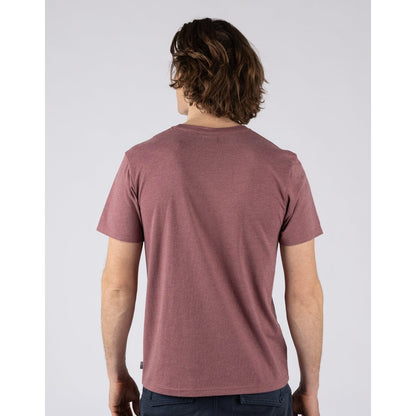 Back view of a man wearing a Saltrock short sleeve Essential crew neck t-shirt in dark pink with a small logo on the chest