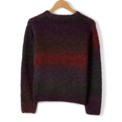 Back view of a Saltrock womens Bowden gradient knit jumper in dark purple and red on a hanger with a white background