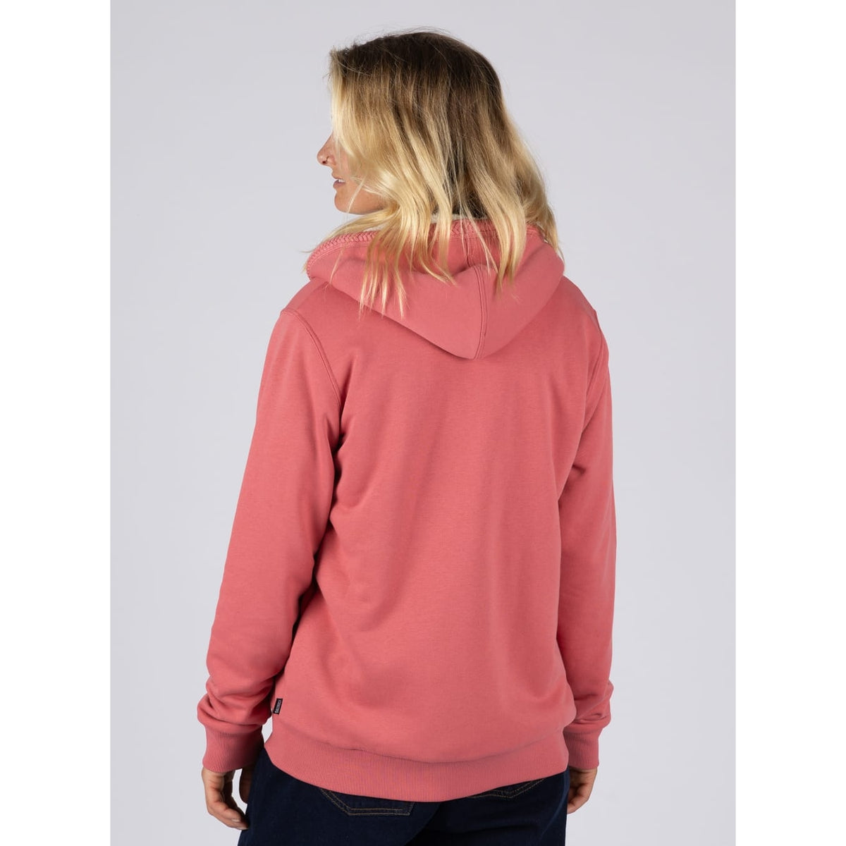 Back view of a woman wearing a Saltrock Borg lined Tamsin full zip hoodie in Pink