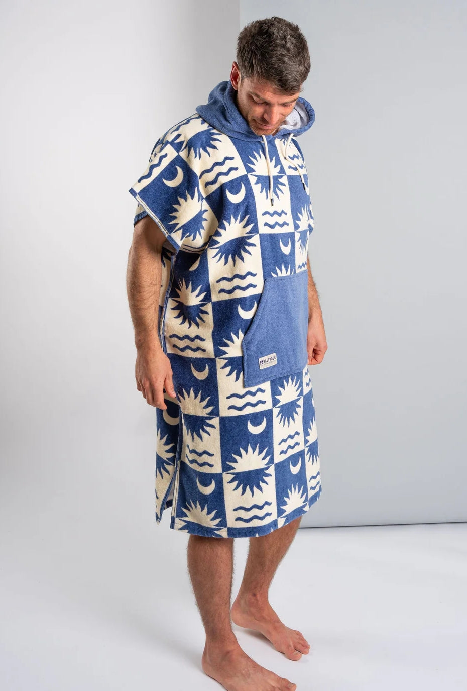 Saltrock changing towel robe blue with hood and sun moon pattern on a man