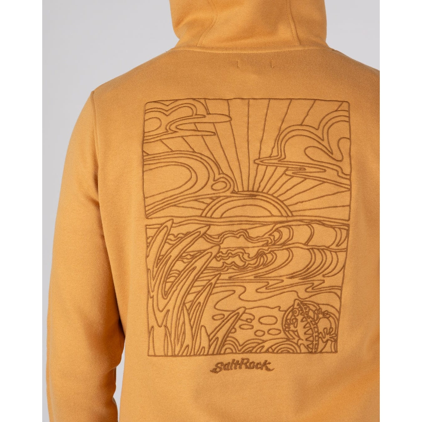 Close-up view of an embroidered surf design on the back of a mens Saltrock Open Finals Linear pop hoodie in yellow