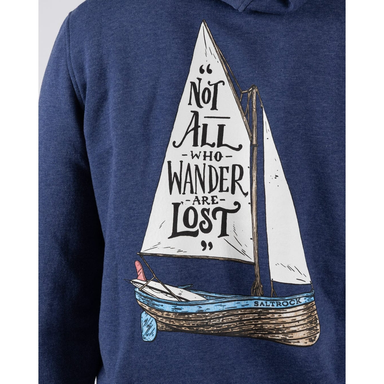 Close-up view of a men's Saltrock Lost Ships pop hoodie in blue featuring a sail boat print with the quote "Not all who Wander are Lost"
