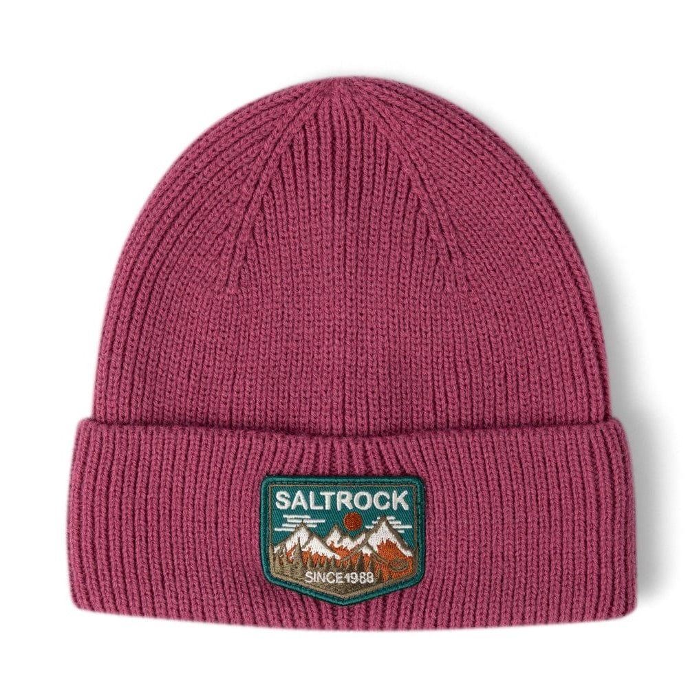 Front view of a Dark Pink Saltrock knitted beanie with turn-up hem and mountains logo patch on a white background