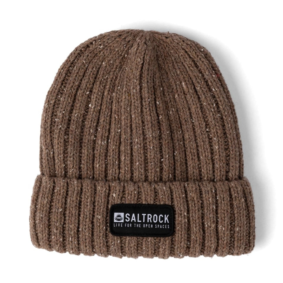 Front view of an adults Saltrock knitted Heritage beanie in brown, with a ribbed, fleck outer fabric, soft faux fur lining and a turn back hem with a black logo patch.