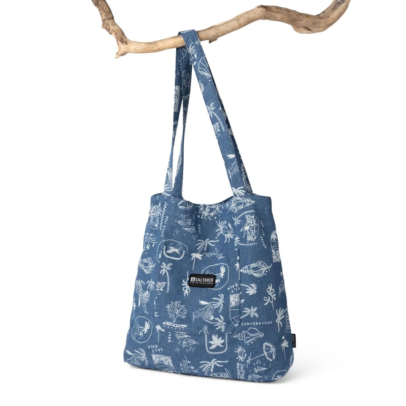 Front view of a Saltrock Island Life shopper bag in denim blue with a white tropical seaside print.