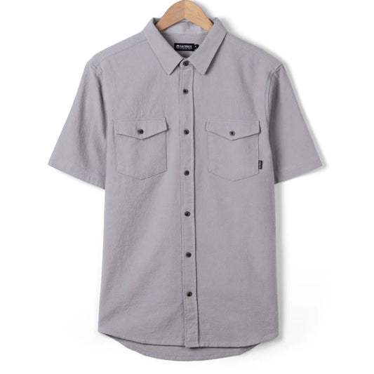 Front view of a men's Saltrock short sleeve Polperro button shirt in grey with a waffle texture and two button pockets on the chest.
