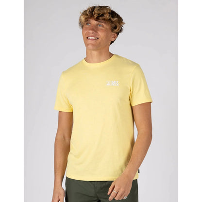 Front view of a man wearing a Saltrock short sleeve Essential t-shirt in light yellow with small chest logo with dark green shorts