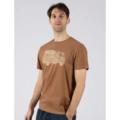 Front view of a man wearing a Saltrock short sleeve t-shirt in brown with a Trail Bus print design on the front