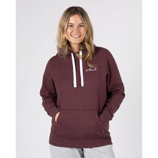 Front view of a woman wearing a Saltrock Velator hoodie in Dark Purple, with a tummy pocket, white hood drawstring and small logo on the chest.