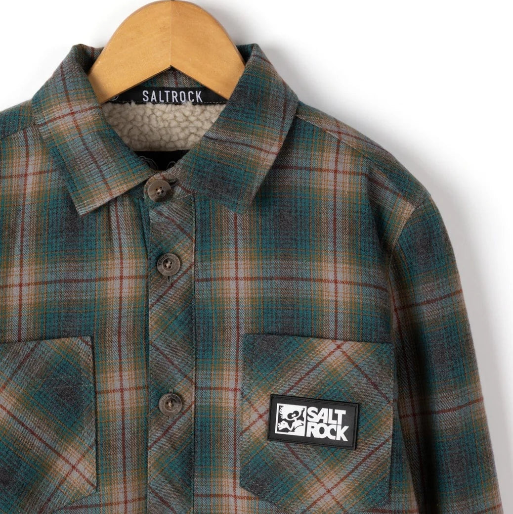 Kids Wiley check shirt in Dark Teal with Salt Rock logo on a hanger against a white background