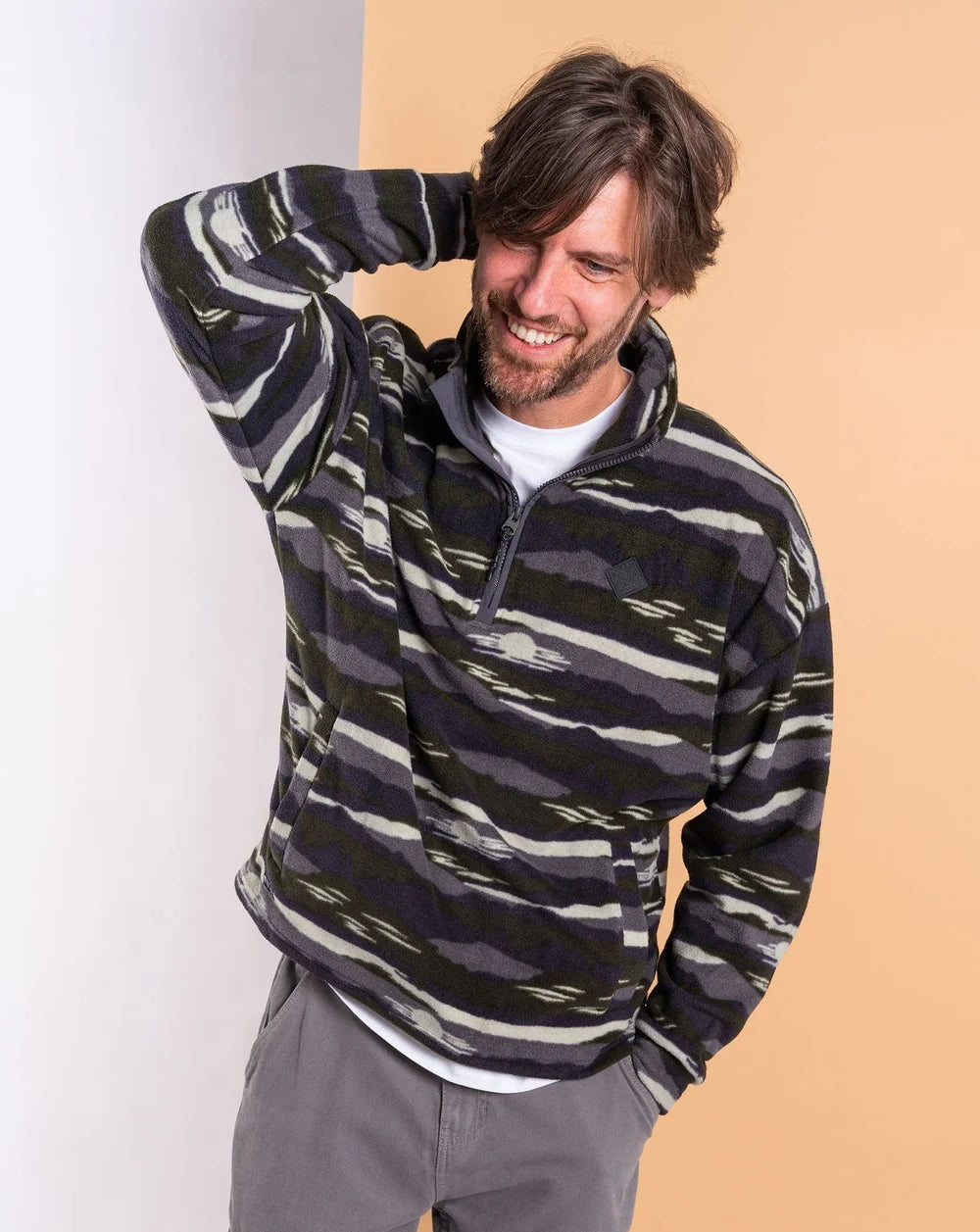 Saltrock mens camo fleece in dark colors, featuring a half-zip design for comfort and style