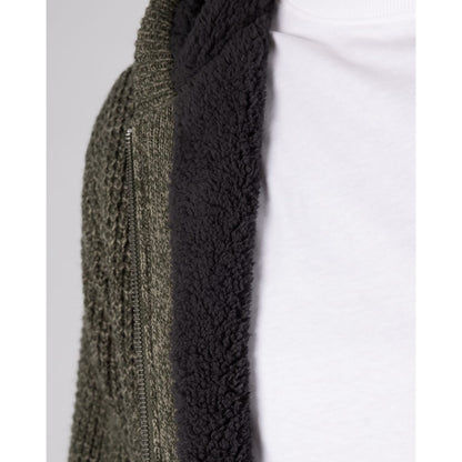 Close-up view of the navy Borg lining of a Saltrock dark green Markus knitted zip hoodie.