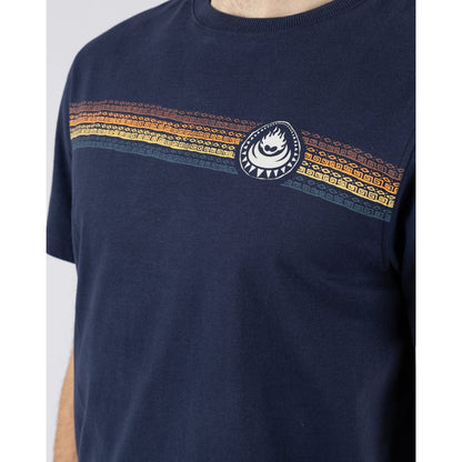 Close-up view of a multicoloured 'tribal-style' stripe print across the chest of a Saltrock short sleeve Tribal Stripe t-shirt in navy.