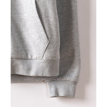 Closeup of a mens Saltrock grey hoodie pocket and cuff on a white background
