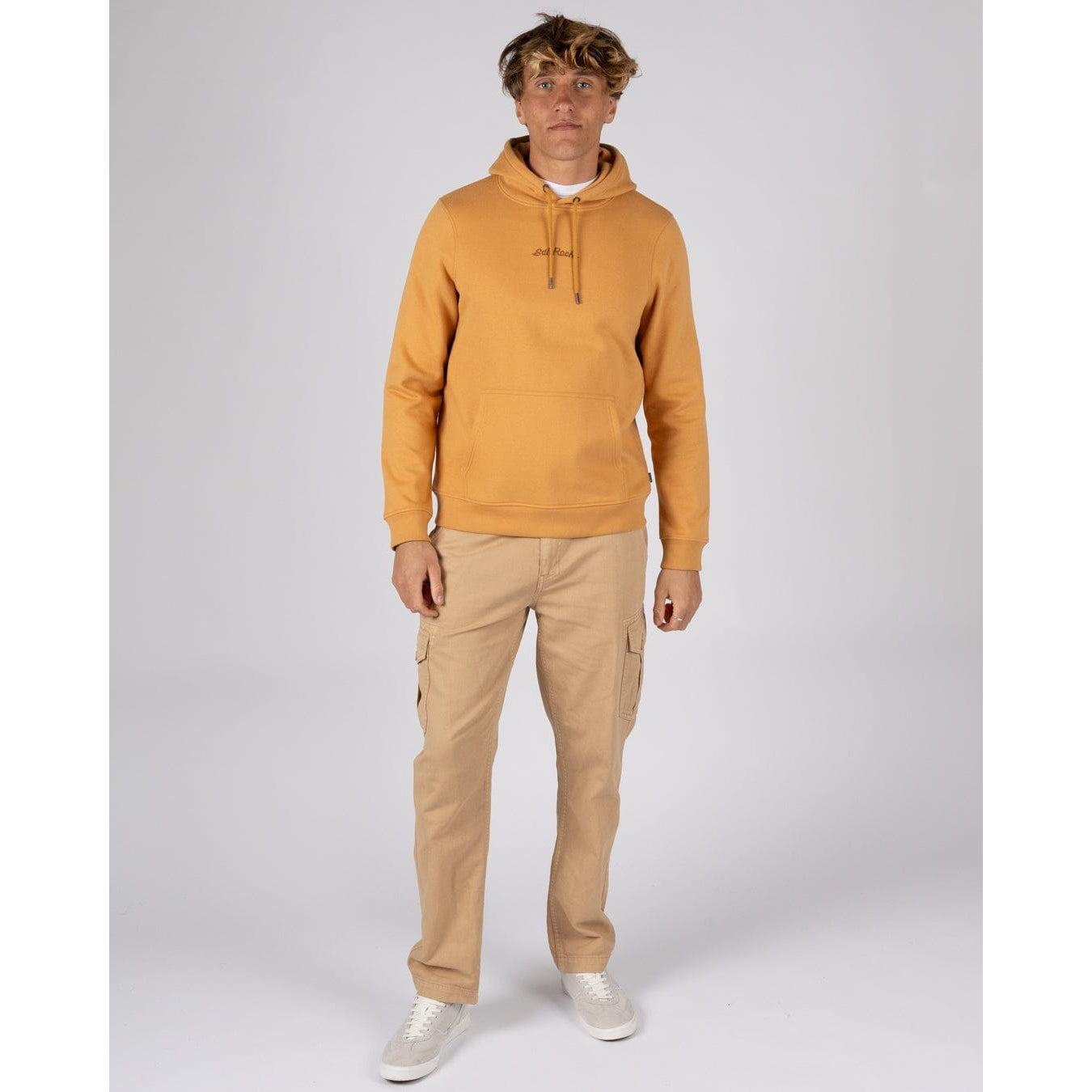 Man wearing a Saltrock Open Finals Linear yellow pop hoodie