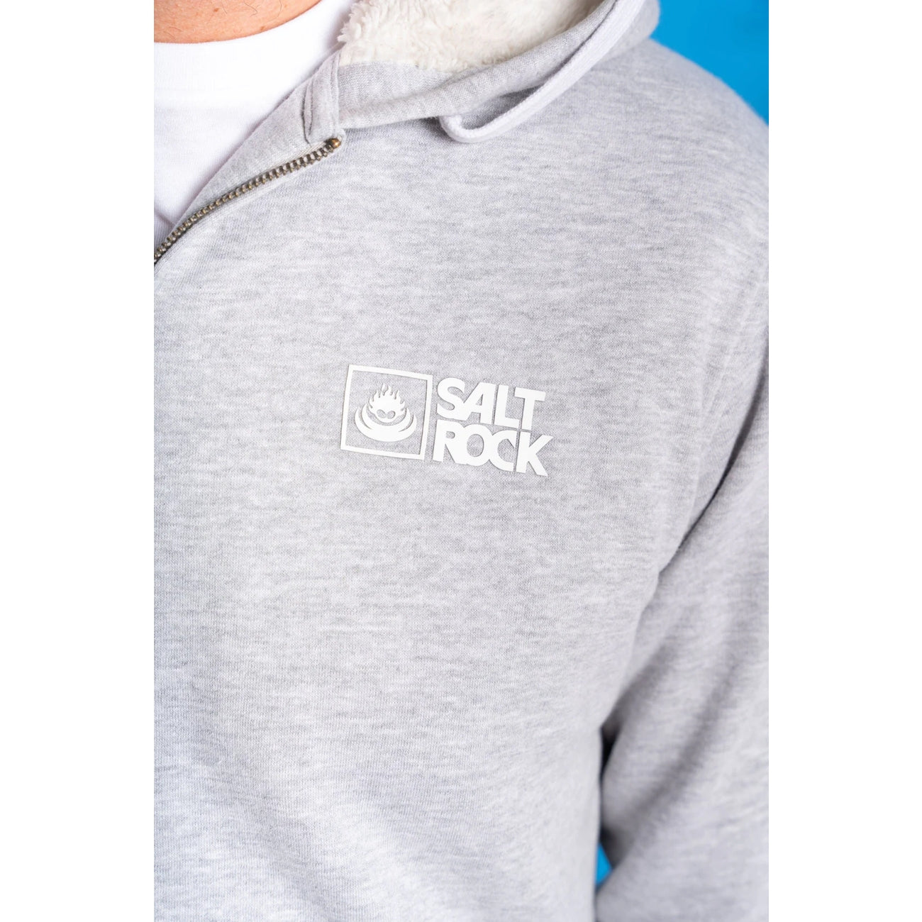 Grey mens faux fur lined zip hoodie with 'Salt Rock' logo on a blue background