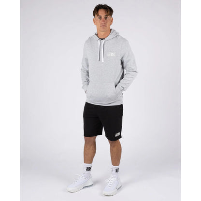 Man wearing a grey Saltrock Original pop hoodie and black shorts on a white background