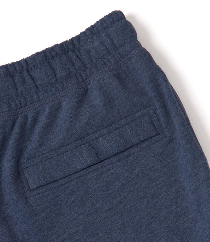 Close-up view of the elasticated waist of a pair of Saltrock men's Original essential sweat shorts in Blue Marl with back pocket.