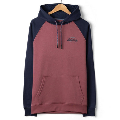 Front view of a mens Saltrock Postcard Script raglan pop hoodie in dark pink with navy blue sleeves and hood