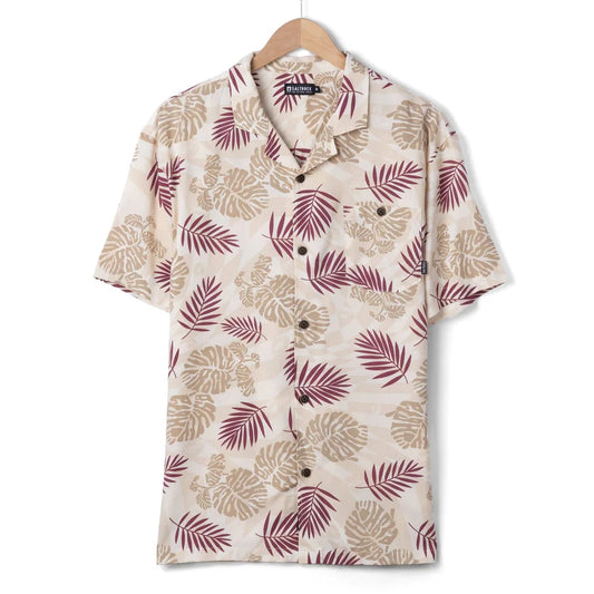Front view of a mens Saltrock short sleeve Warp Surf Resort shirt in cream with a dark red and tan tropical leaves print