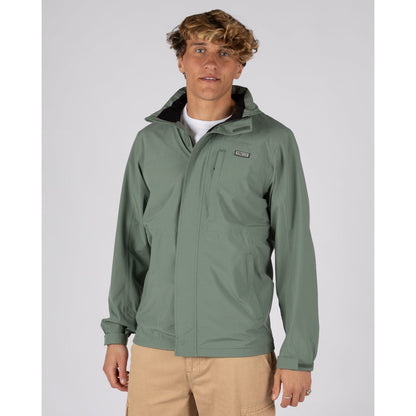Front view of a man wearing a Saltrock Whistler II waterproof jacket in light green