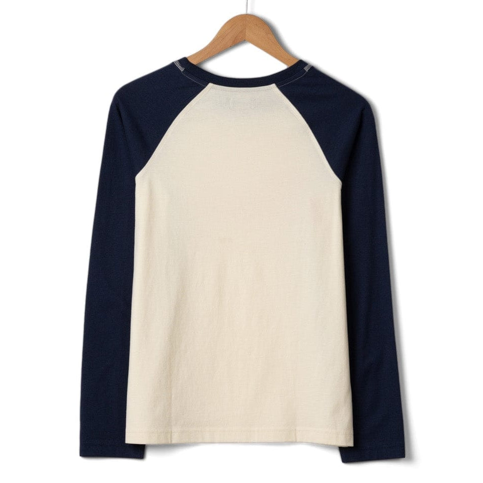 Back view of a womens Saltrock Golden Hour long sleeve raglan t-shirt in cream with navy blue sleeves on a white background