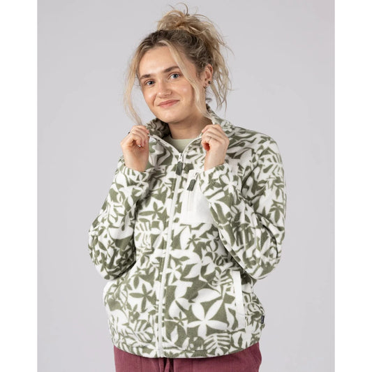 Front view of a woman wearing a Saltrock green floral pattern Balance fleece on a plain background