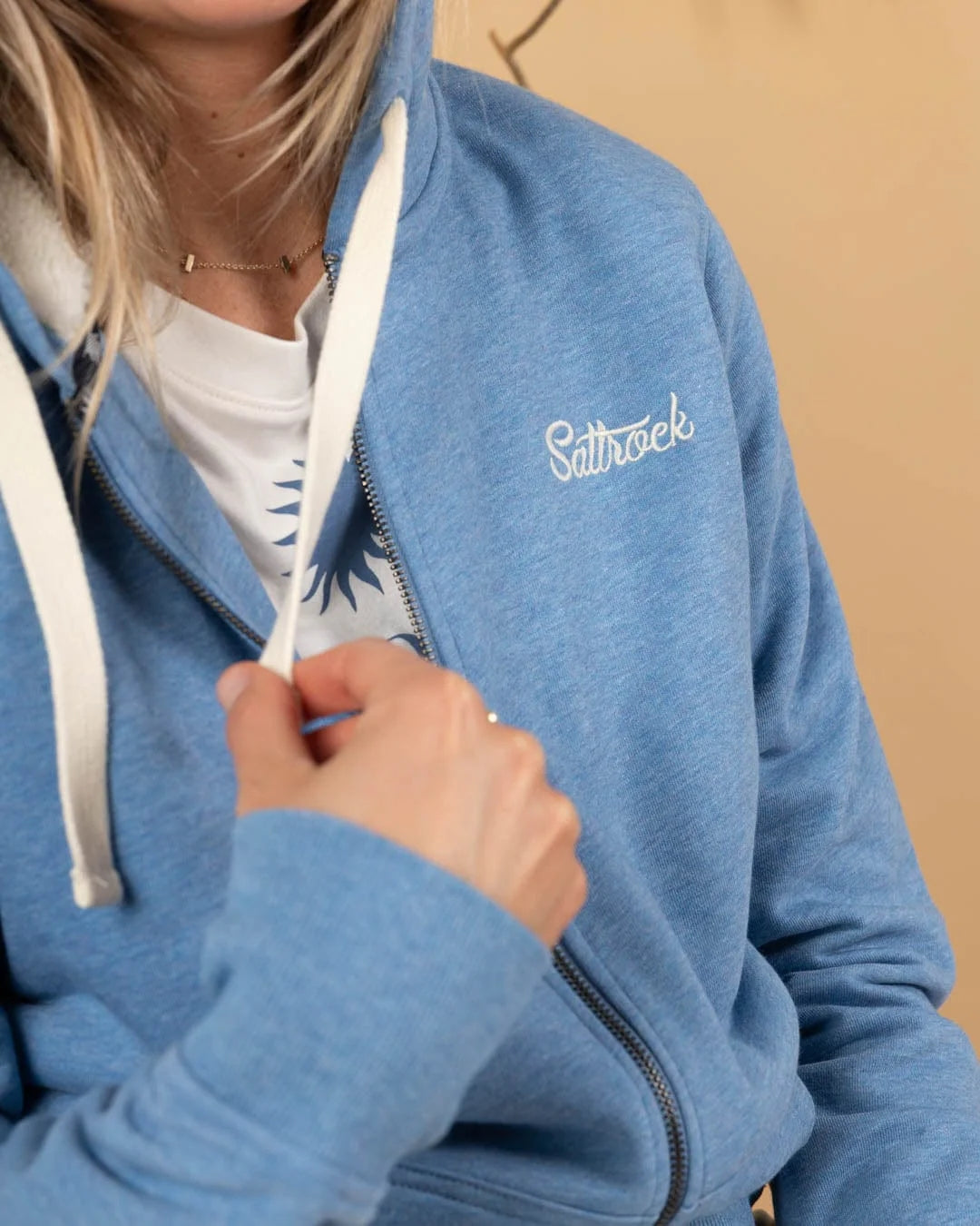 Saltrock womens blue lined hoodie with white drawstrings and zip front detail