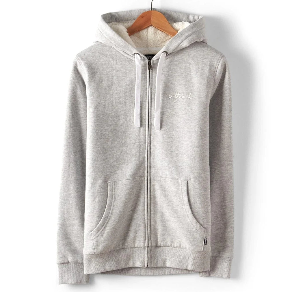 Front view of a womens Saltrock Velator grey borg lined full zip hoodie with a small logo on a white background