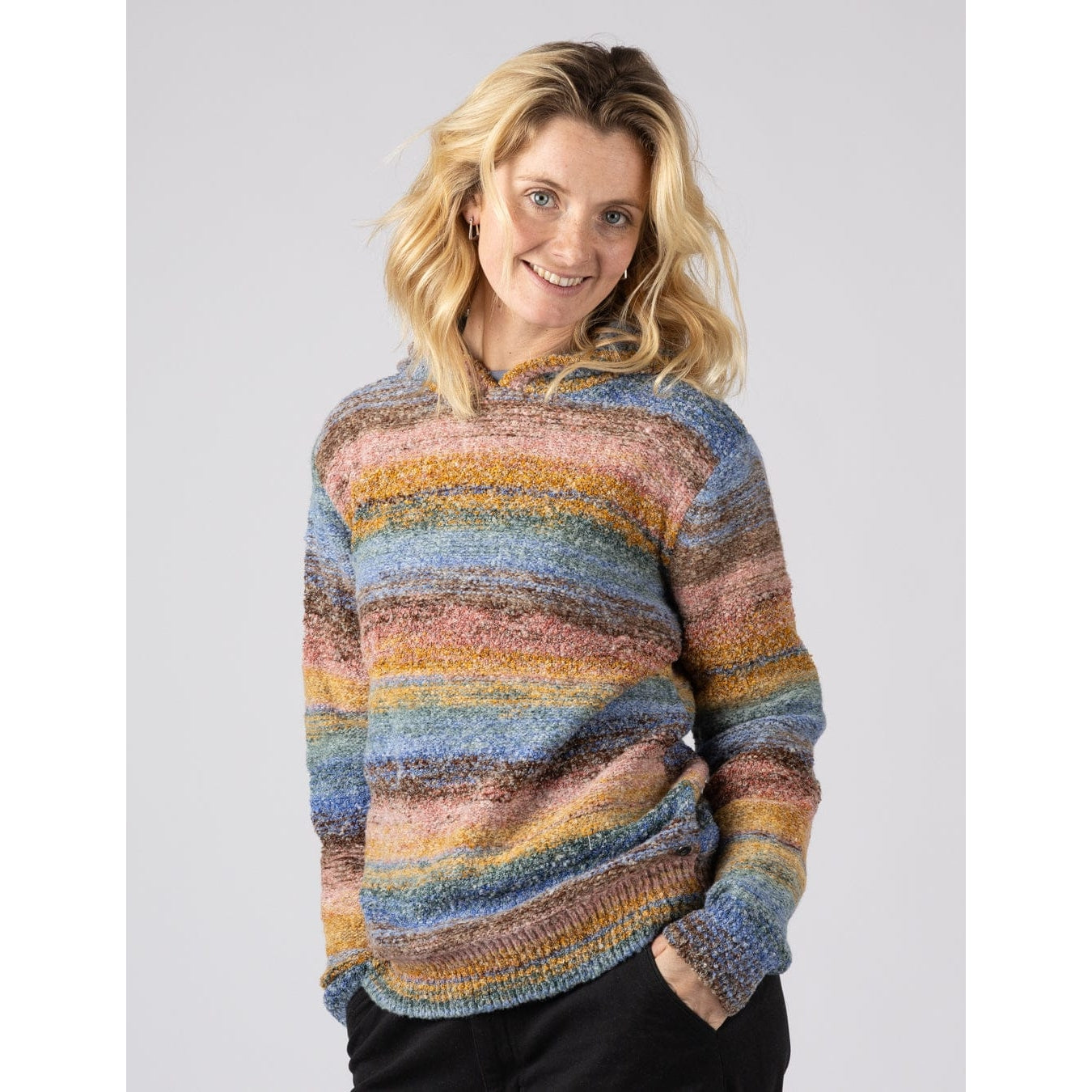 Front view of a woman wearing a Saltrock multicolour striped Space Dye Erin knitted hoodie