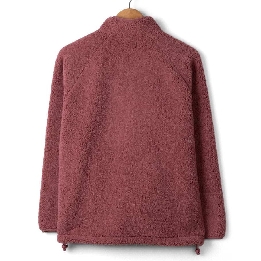 Back view of a womens Saltrock Lya fleece in dark pink on a hanger against a white background