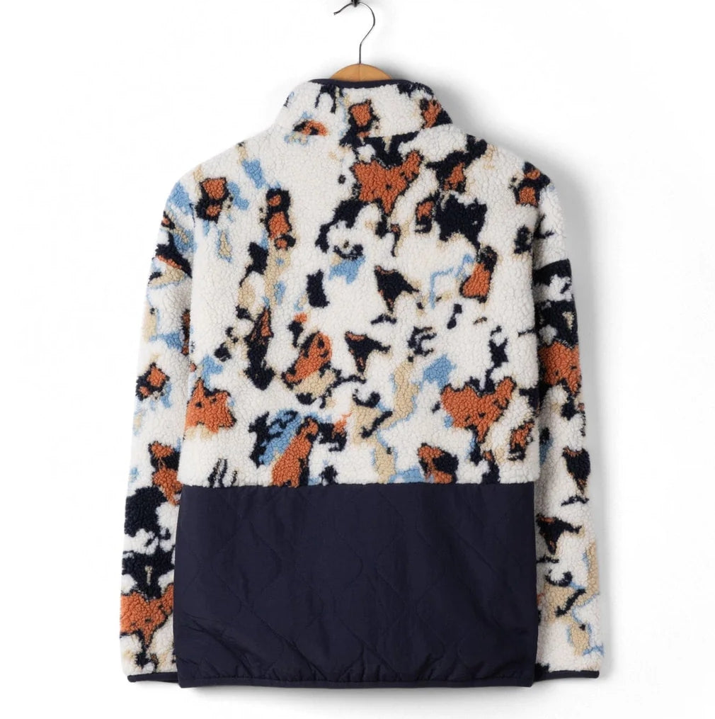 Patterned Saltrock Folie fleece with a dark blue base on a white background