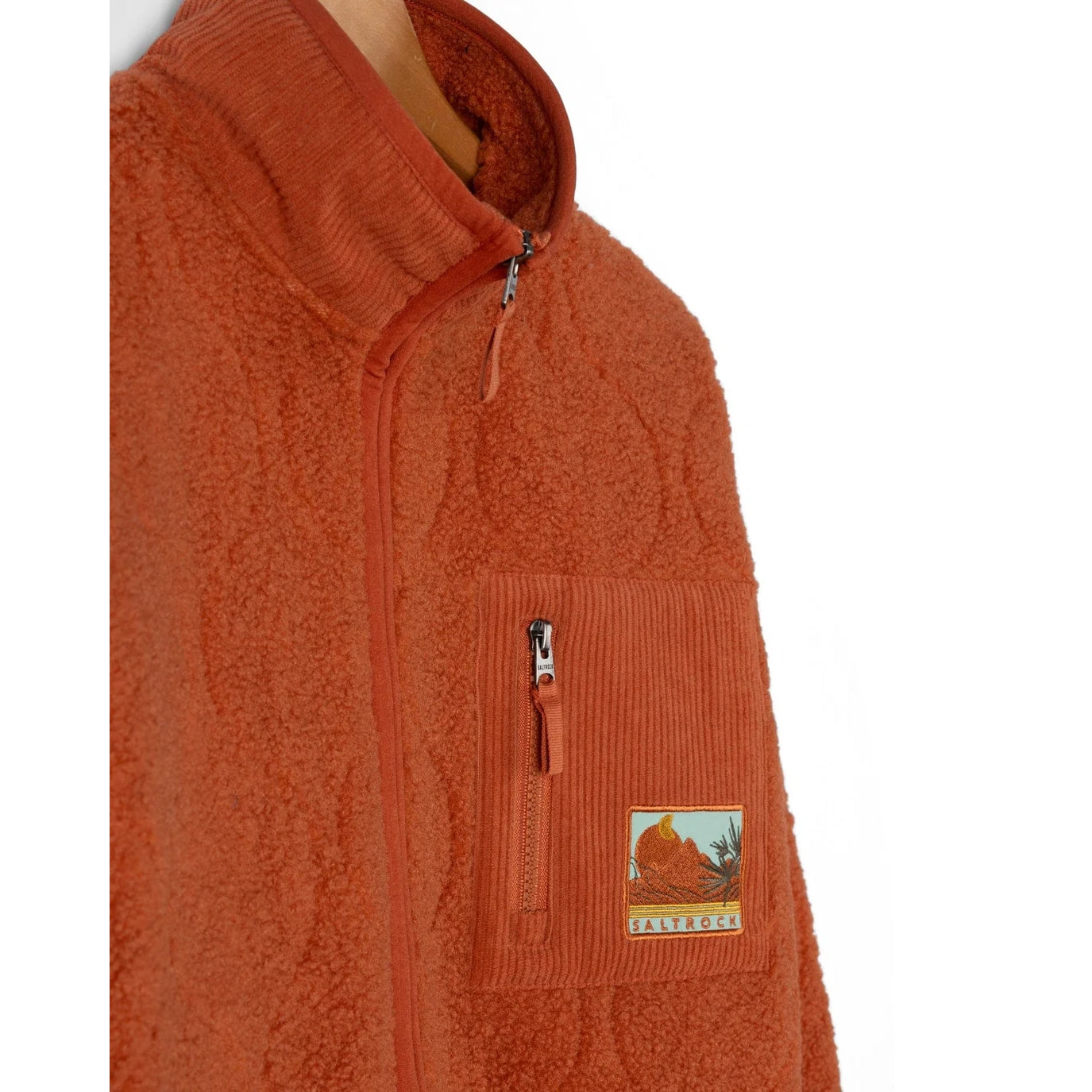 Saltrock womens orange Jarvis fleece with a chest zip pocket on a white background
