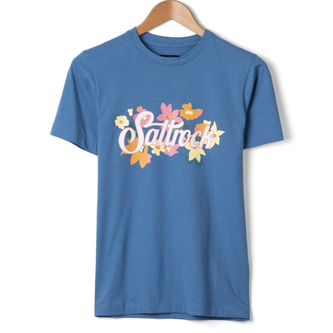 Front view of a short sleeve womens Saltrock Trader Daze t-shirt with floral logo print on the chest on a hanger against a white background